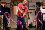 Cutting the lei.