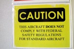 Aircraft does not comply with federal safety regulations.