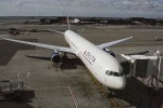 A Delta 767 parked at what is currently T4 West's southernmost gate. The West concourse will have nine additional gates when the expansion project is completed.