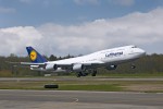 Lufthansa 747-8I takes off on a test flight. (Photo by Boeing)