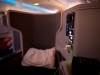 Yet looking backward while in lie flat mode one can also see that the space near the head is a little exposed. Stil, very comfortable.