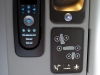 Here you can see the remote (again) along with other seat controls, reading light, and power/USB outlets.