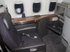 Meanwhile, up front, Flagship Suites were seriously pampering some lucky passengers. Besides being palatial, this seat also converts to a work space, with the seat turning to face the windows (which we think is unreal awesome). That little smart device like thing controls your entire experience. It even flies the plane (just kidding). Eric Dunetz / @southpawcaptures