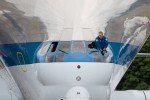 NASA pilot peeks out Super Guppy's windshield. (Photo by Liem Bahneman/NYCAviation)