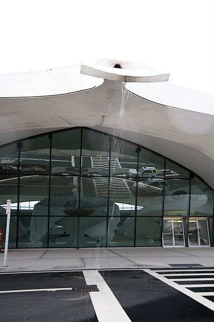 The very nature of the building evokes the natural organic beauty of mother nature's creatures of flight, particularly a butterfly raising its wings to fly. The design even allowed the building to channel rain water from the roof into a gentle waterfall welcoming travelers as they began their journey. The very nature of the building evokes the natural organic beauty of mother nature's creatures of flight, particularly a butterfly raising its wings to fly. The design even allowed the building to channel rain water from the roof into a gentle waterfall welcoming travelers as they began their journey.
