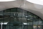 The very nature of the building evokes the natural organic beauty of mother nature's creatures of flight, particularly a butterfly raising its wings to fly.  The design even allowed the building to channel rain water from the roof into a gentle waterfall welcoming travelers as they began their journey.