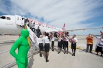 Green Man welcomes passengers from Virgin America's innaugural flight from LAX to PHL as they exit the plane. (Photo by Manny Gonzalez/NYCAviation)
