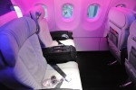 Virgin America First Class seats under the purple mood lighting. (Photo by Manny Gonzalez/NYCAviation)