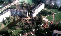 A 747 freighter being flown by El Al crashed into this apartment complex in Amsterdam, killing 39 on the ground in addition to the 4 on-board.