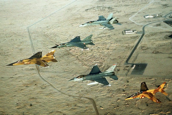 Coalition aircraft in formation over Saudi Arabia during Operation Desert Shield. From left to right: Qatari F-1 Mirage, French F-1C Mirage, US Air Force F-16C Fighting Falcon, Canadian CF/A-18A Hornet and Qatari Alpha Jet. (Photo by US Air Force/Staff Sgt. Lee Corkran)
