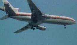 United Flight 232 on final descent, with visible damage to its tail.