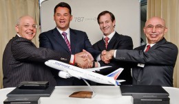 Boeing and Transaero executives celebrate the deal aboard the 787 Dream Tour plane over Russia. From left: Alexander Krinichansky, Transaero Airlines executive director; Alexander Pleshakov, Transaero Airlines chairman of the board; Marty Bentrott, vice president of Sales for Middle East, Russia and Central Asia, Boeing Commercial Airplanes; Serdar Gurz, director international Sales, Boeing Commercial Airplanes. (Photo by Boeing)