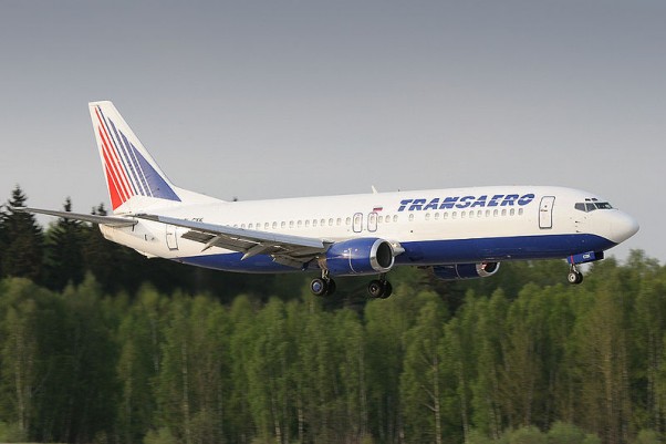 A Transaero Boeing 737-400 (EI-CXK) lands at Moscow Domodedovo Airport.