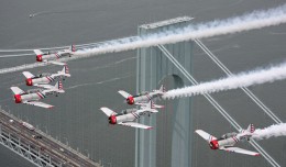 Geico Skytypers buzz the Verrazano Narrows Bridge. (Photo by Scott Snorteland/srsimages.com)