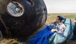 Expedition 32 NASA Flight Engineer Joe Acaba signs the side of his Soyuz TMA-04M spacecraft shortly after he landed with his Expedition 32 crewmates. (Photo by NASA/Carla Cioffi)