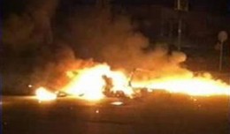 Burning wreckage of the helicopter as shown on a local TV station.