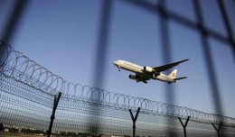 An Air China plane prepares to land at the Beijing Capital International Airport. (Photo by Wang Zhao/AFP/File)